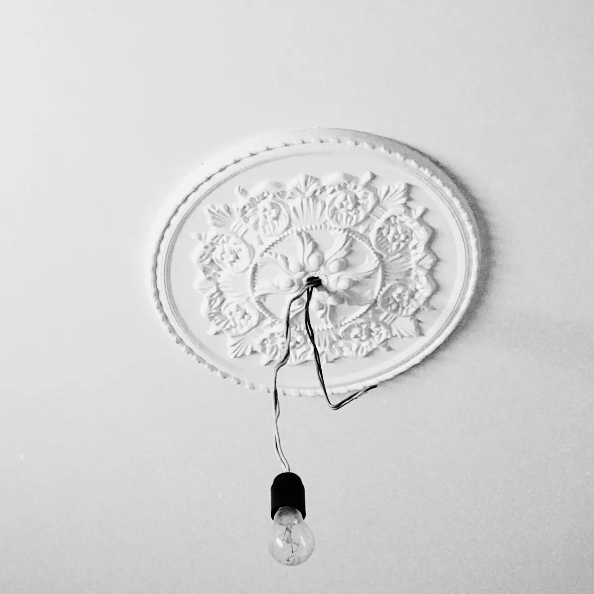 Ceiling rose with a pendant bulb