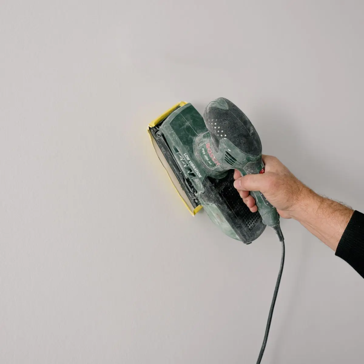 Sanding back a filled wall before the final coat