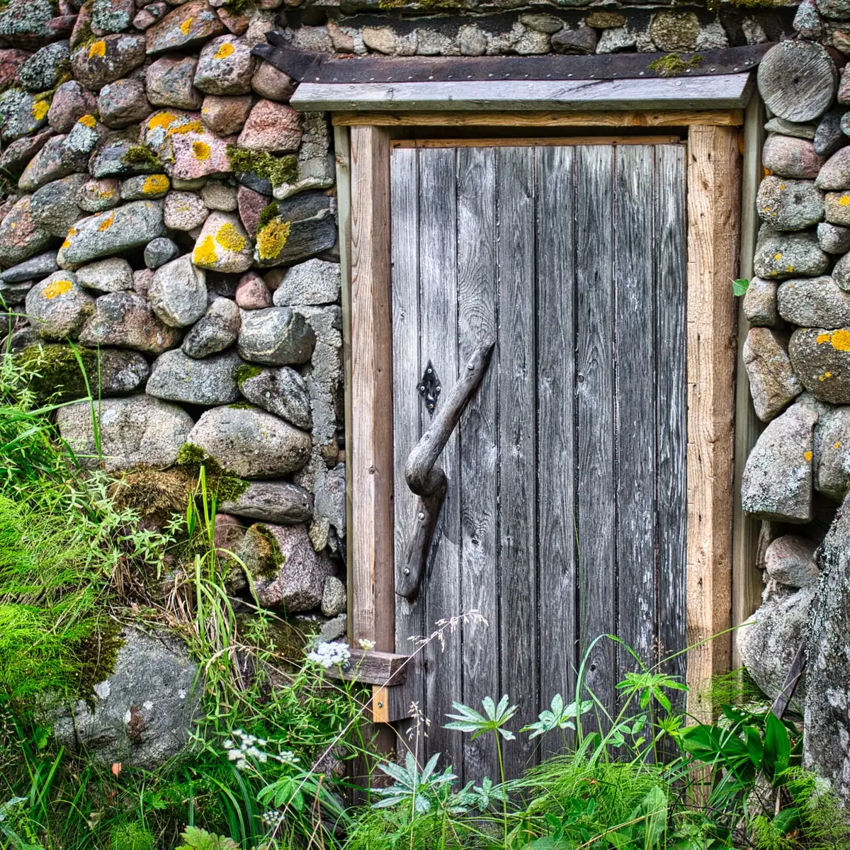 Timber door in a drystone wall