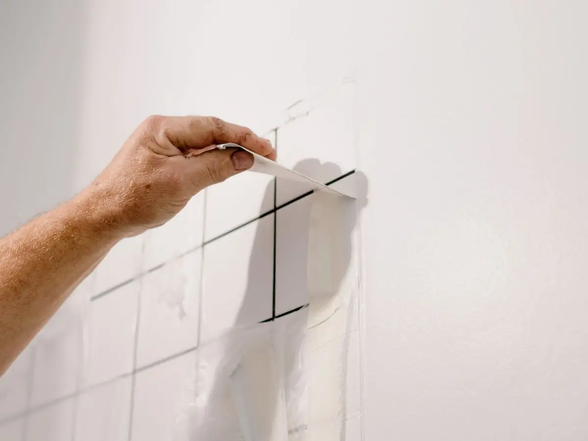 Marking out a wall before boards are fixed