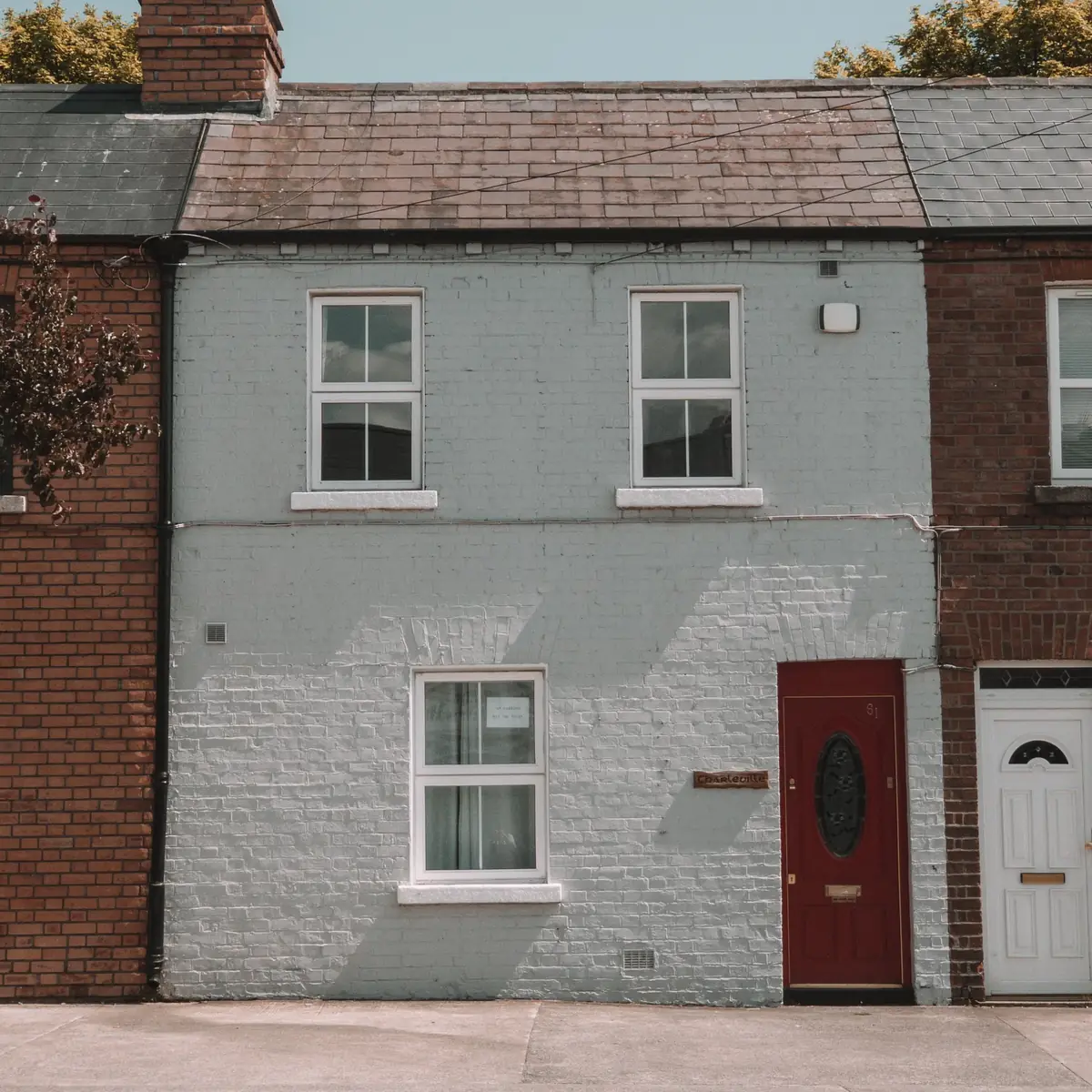 Brick house after render removal
