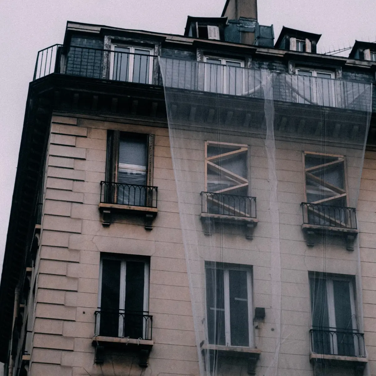 Rendered building under renovation scaffold