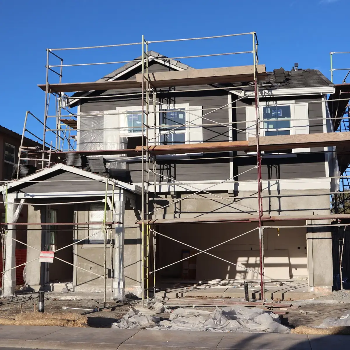 House scaffolded ready for render