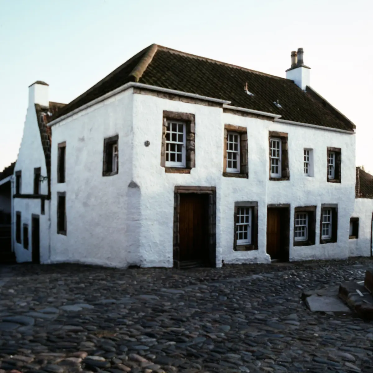 White rendered houses on a village street