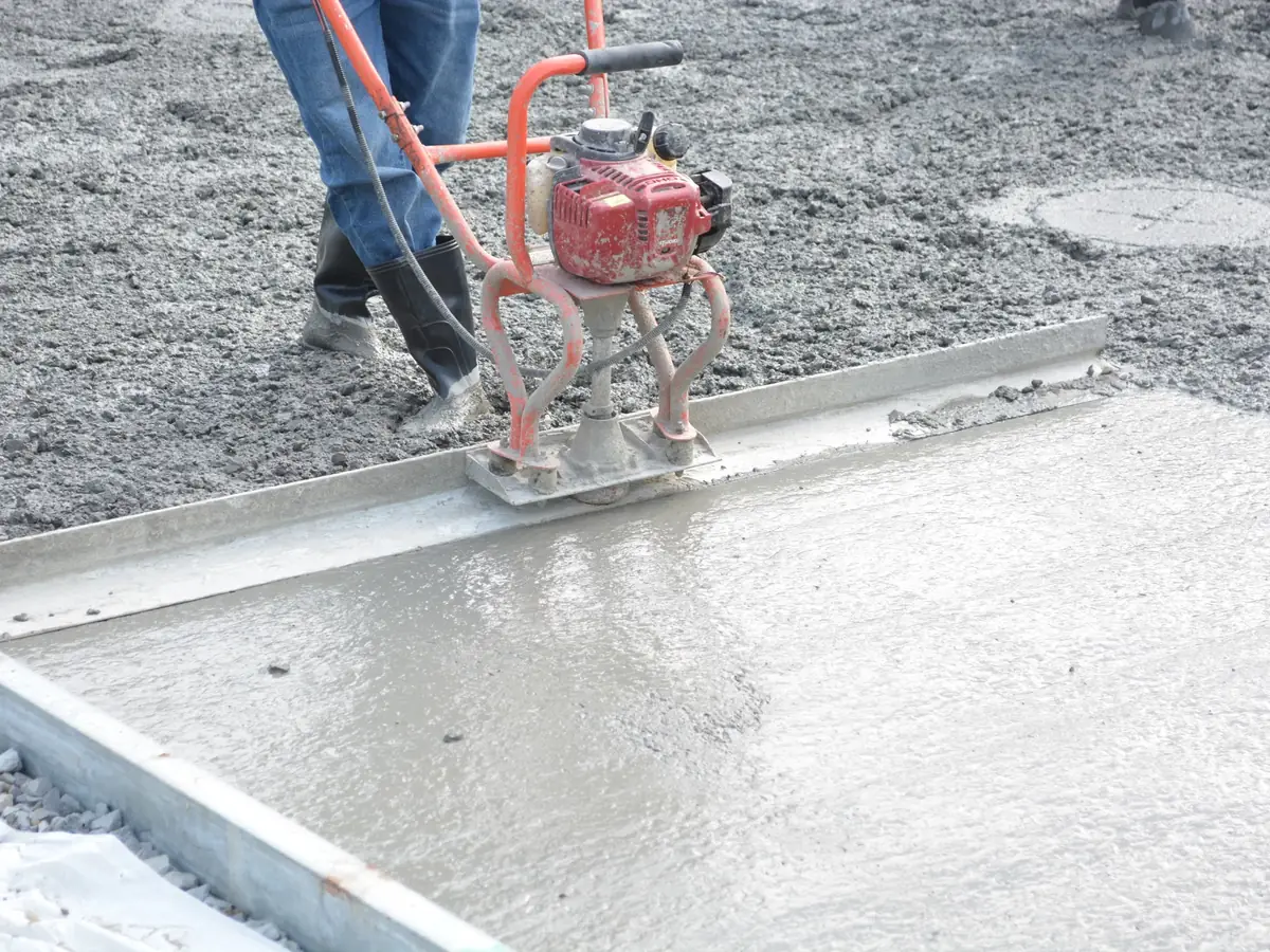 Power float finishing a large floor slab