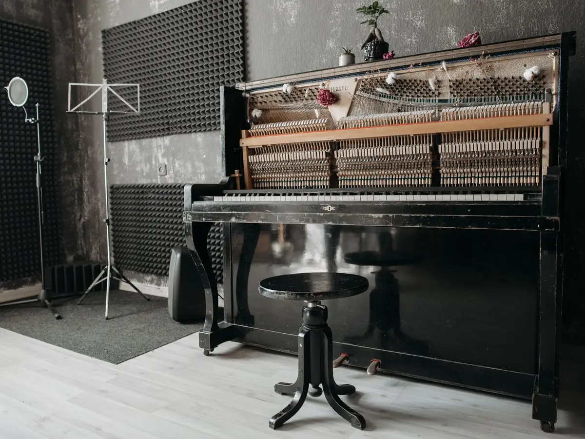 Upright piano in a treated music room