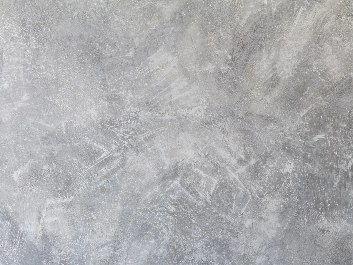 Grey microcement surface with subtle trowel variation